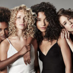 Four women with texture hair.