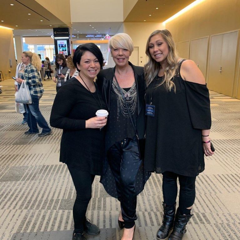 Tabitha Coffey with two cosmetology students